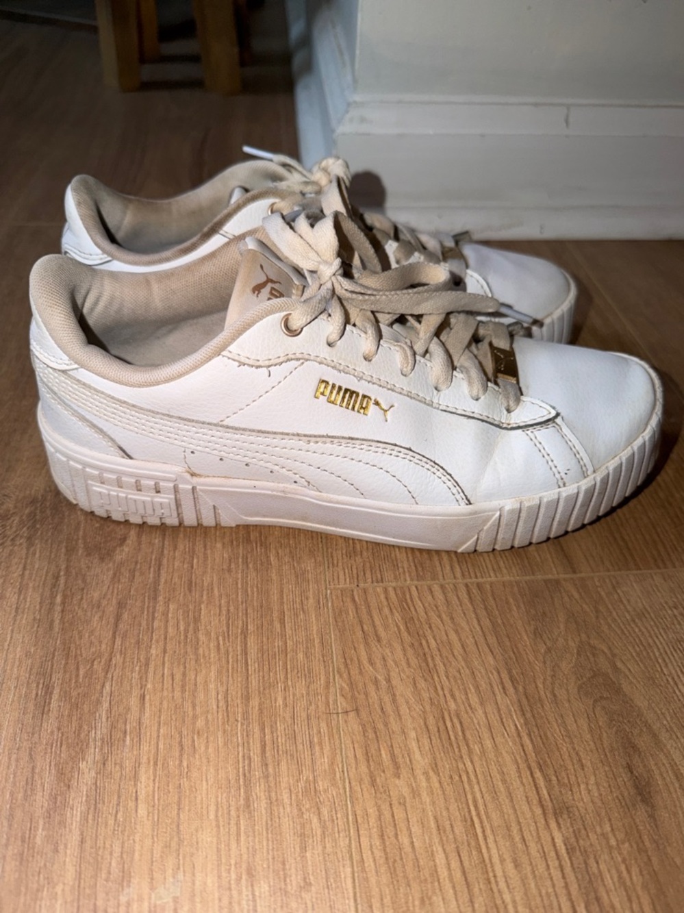 Puma White Low-Top Sneakers with Gold Accents